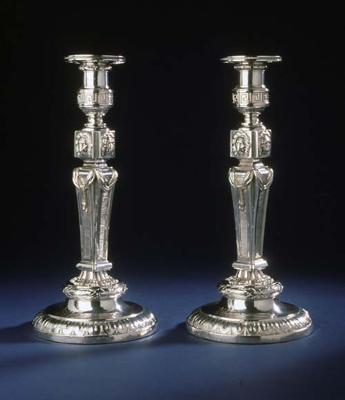 Pair of 'Lyon-faced' candlesticks